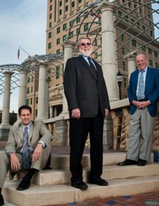 This image is of Partners Patrick McCroskey, Dave Hillier, and Howard Gum (ret.) on the Mall in front of the courthouse in 2011