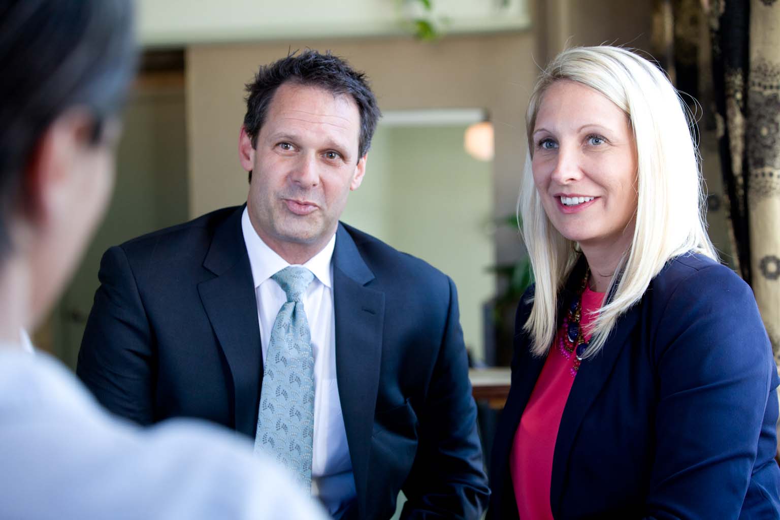 Image of Asheville DIvorce Lawyers, Patrick McCroskey and Janet Amburgey, at a downtown Asheville location. Both are Business North Carolina Legal Elite Listees in 2018