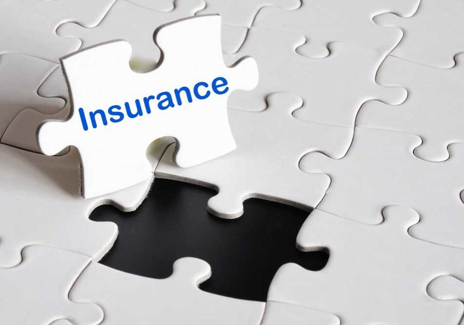 Divorce and Health Insurance A white puzzle with one missing piece labeled insurance suggesting that insurance is a part of the puzzle