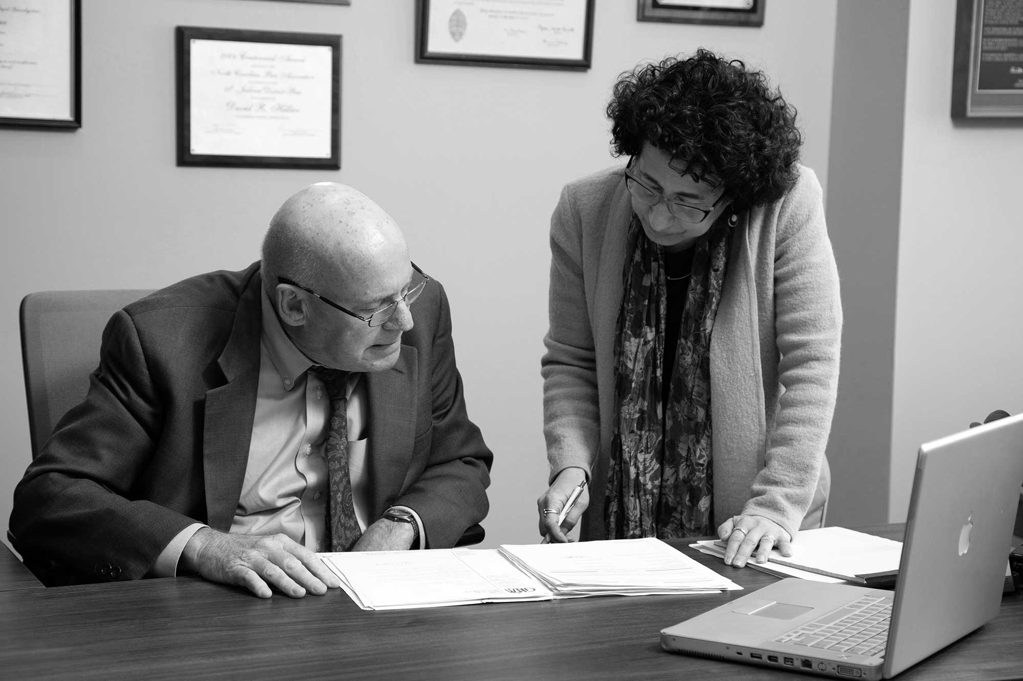 David Hillier, Bankruptcy Lawyer David Hillier with his long time assistant, Idelle David, reviewing a filing