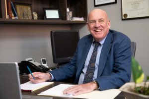 Biography image for David Hillier taken in his office at the newly renovated 47 North Market Street Building owned by the firm for decades.