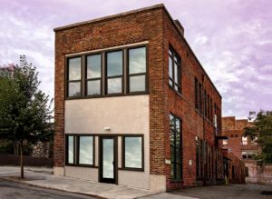 Image of the newly renovated historic building where the law firm is located on Market Street in Downtown Asheville.