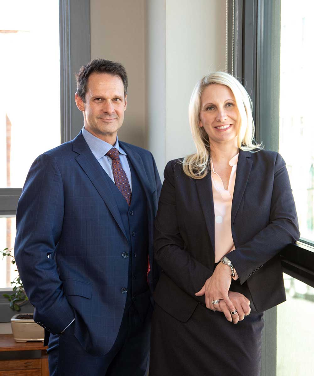 Image of Patrick McCroskey & Janet Amburgey in their offices in historic downtown Asheville