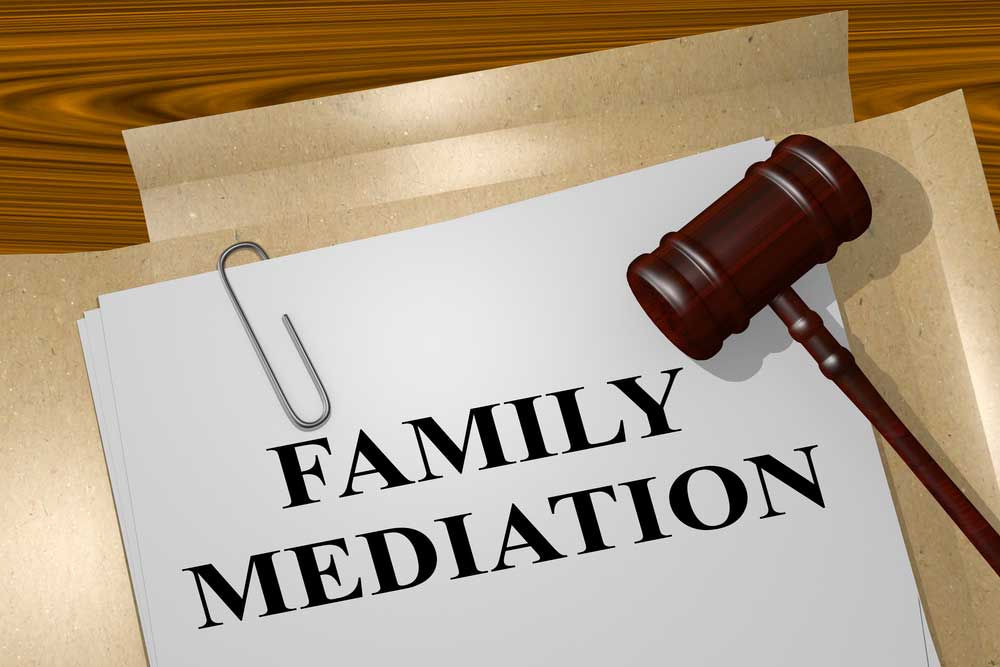 Image of a folder entitled Family Mediation, with a gavel, depicting the concept of mediation in divorce.