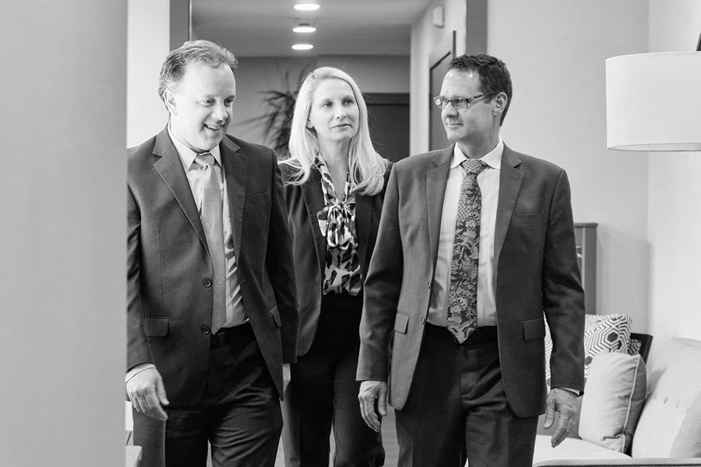 Soren Campbell, Janet Amburgey, and Patrick McCroskey at their offices in downtown Asheville.