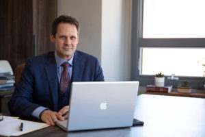 Patrick McCroskey at his desk at the newly renovated 47 North Market Street historic building