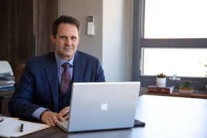 Image of Patrick McCroskey at his desk at the newly renovated 47 North Market Street historic building