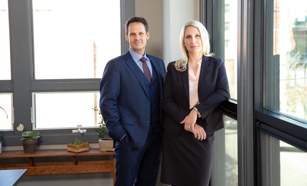 This is an image of Janet Amburgey and Patrick McCroskey, Asheville Family Law & Divorce Lawyers, at their offices in Historic Downtown Asheville