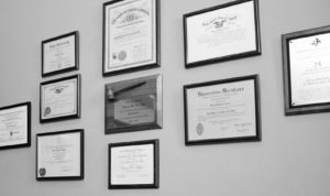 Black and white photo for of David R. Hillier's credentials and awards.