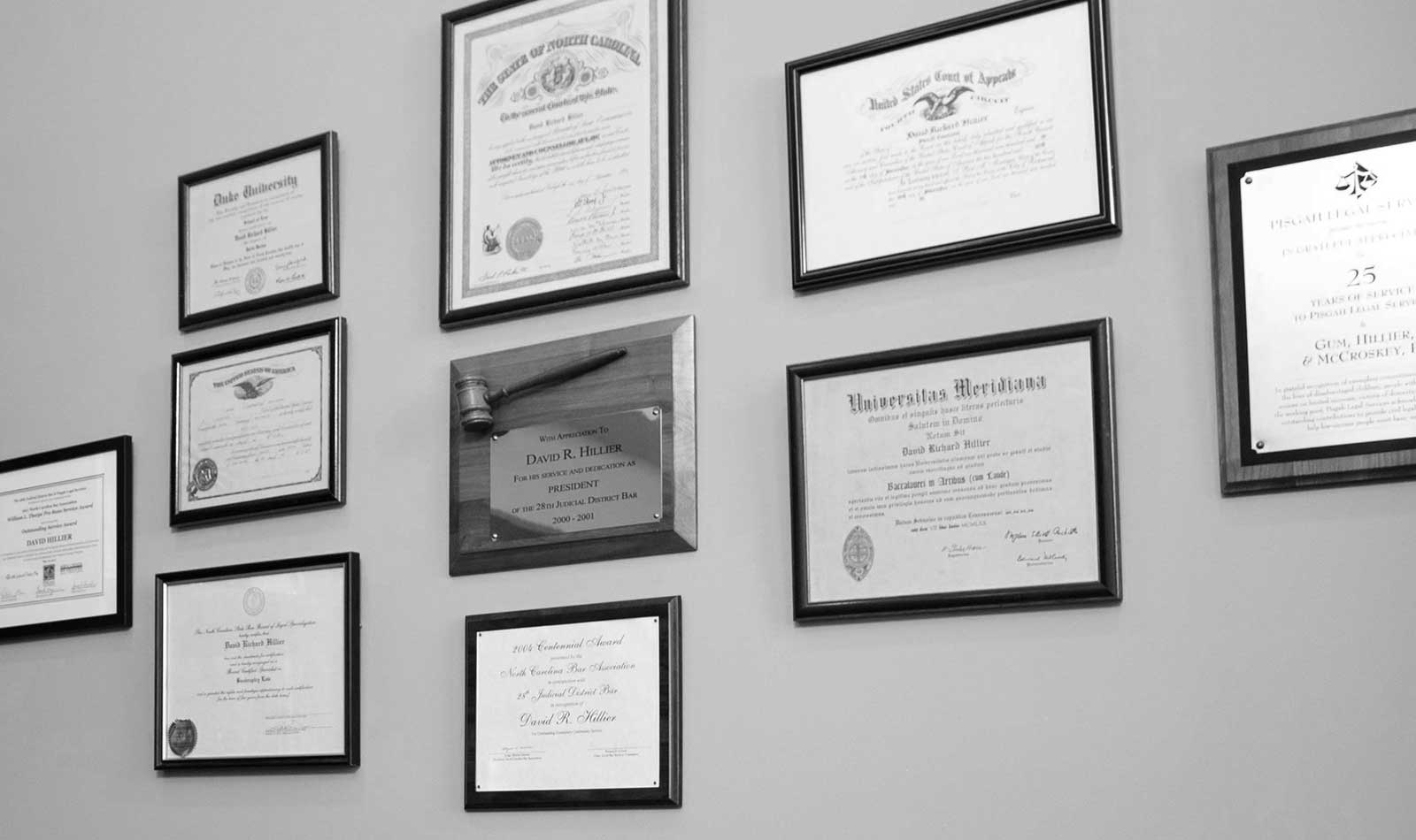 referrals-practices Black and white photo for of David R. Hillier's credentials and awards.